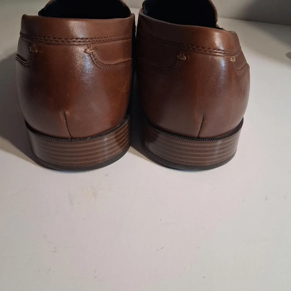 Mens brown leather loafers slip onCole Haan new condition no flaws